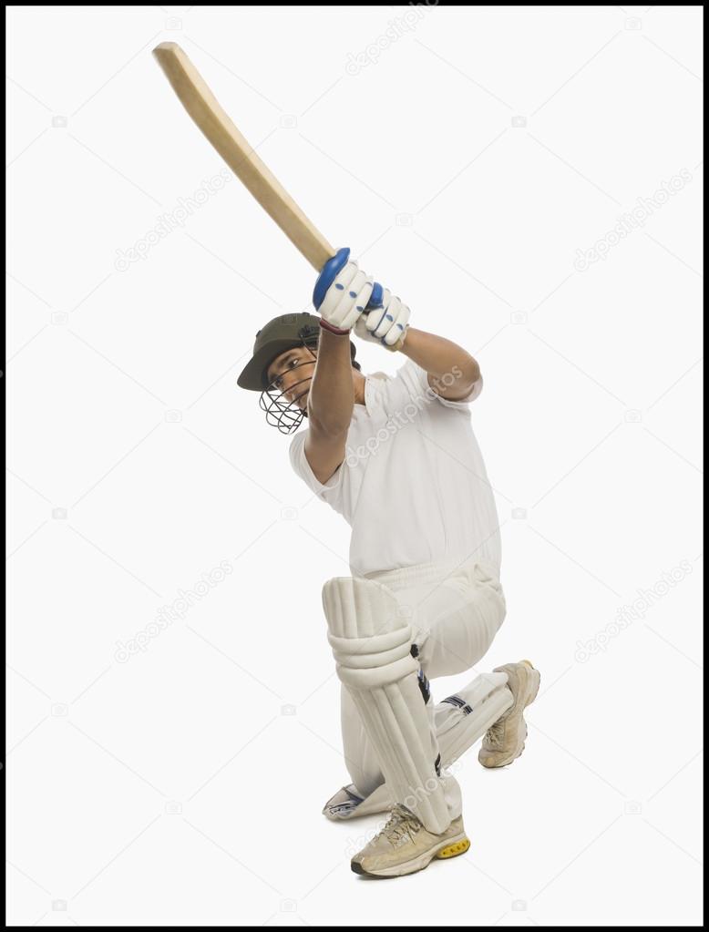 Cricket batsman playing a cover drive