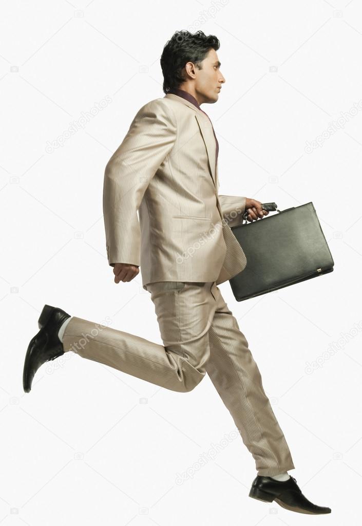 Businessman running