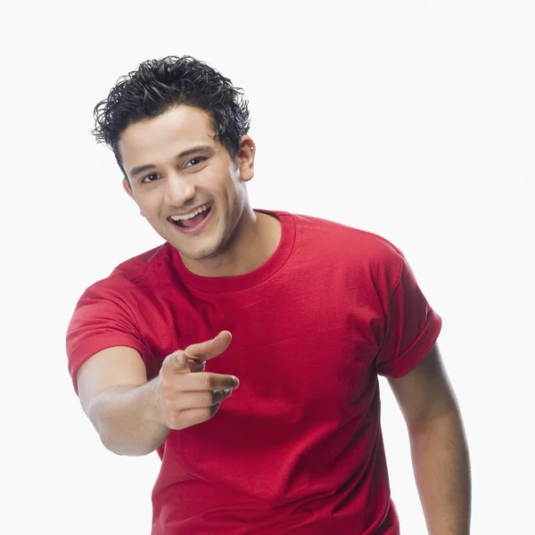 Man pointing and smiling — Stock Photo, Image