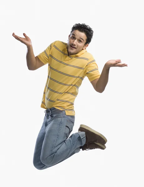 Man posing while jumping — Stock Photo, Image