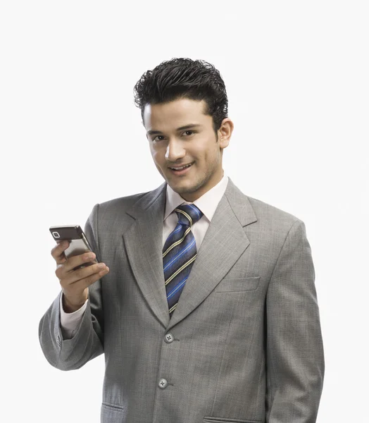 Businessman using a mobile phone — Stock Photo, Image