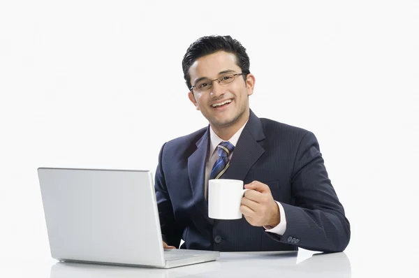 Businessman drinking coffee — Stock Photo, Image