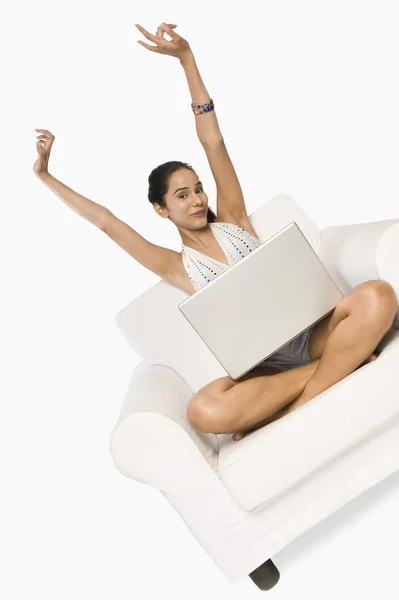 Woman using a laptop — Stock Photo, Image