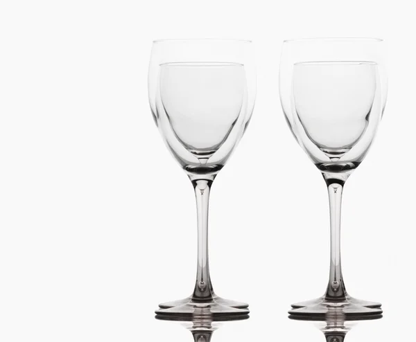 Empty wine glasses on a table — Stock Photo, Image