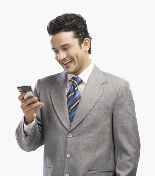 Businessman using a mobile phone — Stock Photo, Image