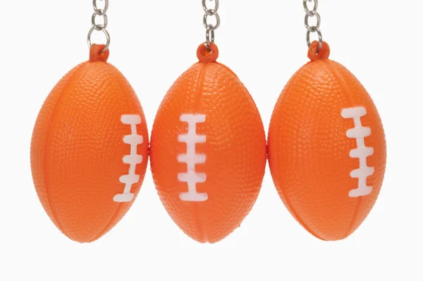 American football shaped key rings — Stock Photo, Image