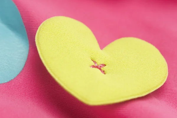 Heart shape on a baby's top — Stock Photo, Image