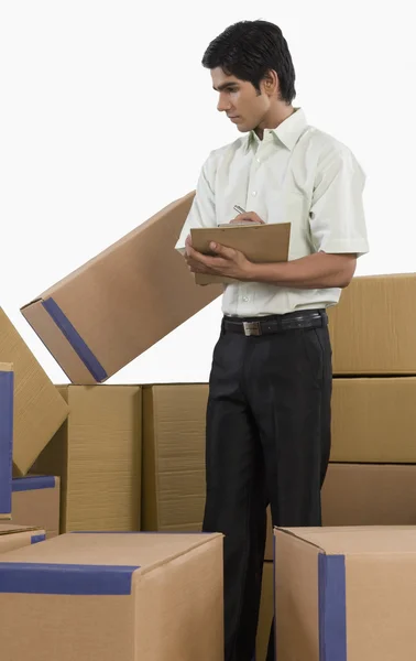 Store manager checking inventory — Stock Photo, Image