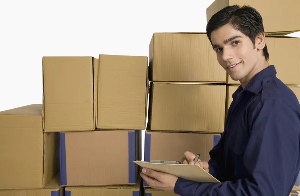 Store manager checking inventory — Stock Photo, Image