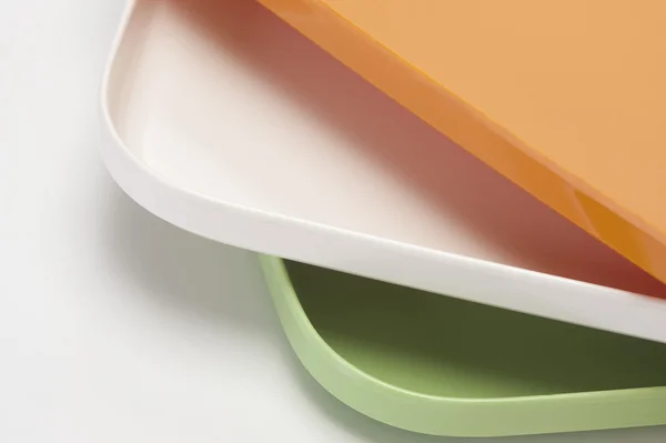 Stack of colorful trays — Stock Photo, Image