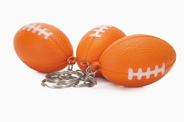 American football shaped key rings — Stock Photo, Image