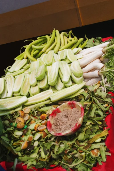 Cucumber and radish at a market stall — Stock Photo, Image