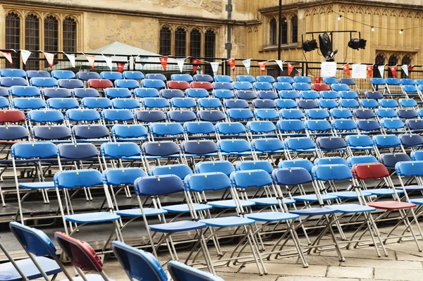 Rows of chairs in courtyard