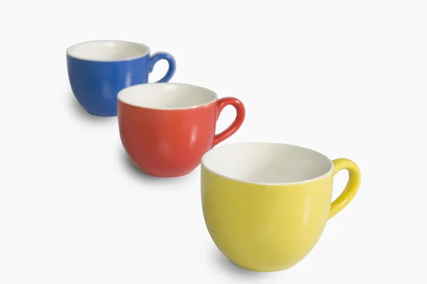 Tasses à thé colorées dans une rangée — Photo