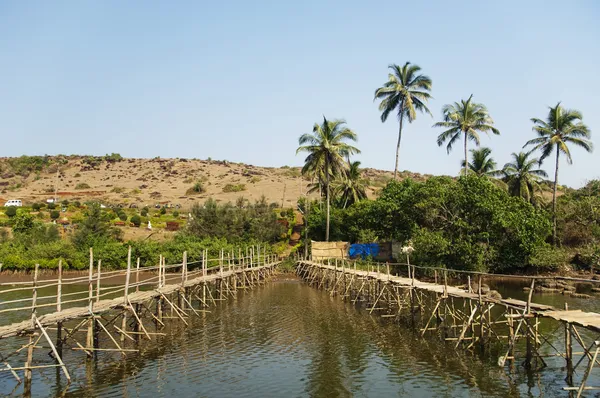 Two wooden bridges across the river — Stock Photo, Image