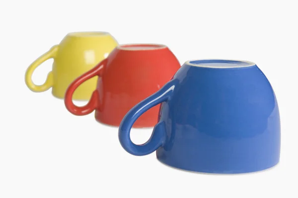 Copos de chá coloridos em uma fileira — Fotografia de Stock