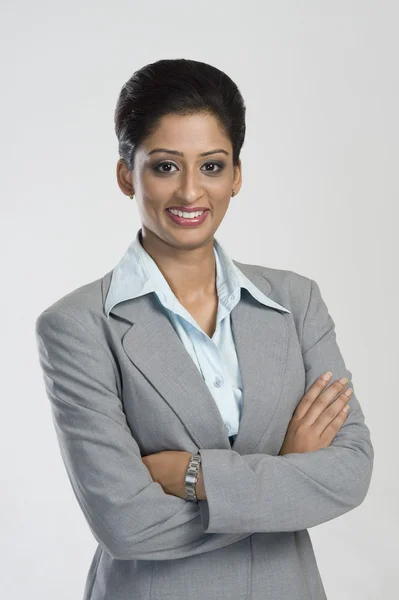 Businesswoman with crossed arms — Stock Photo, Image