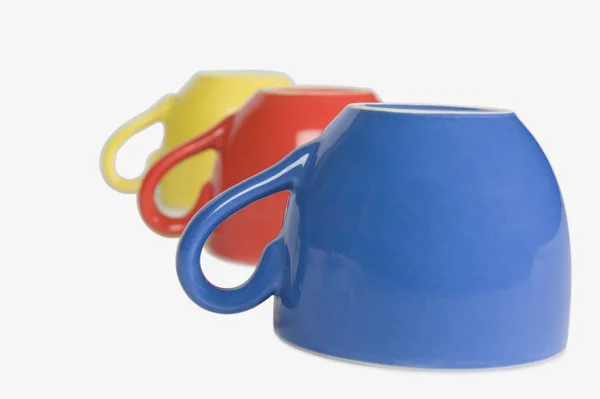 Colorful tea cups in a row — Stock Photo, Image