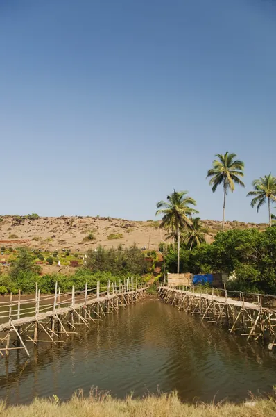 Two wooden bridges across the river — Stock Photo, Image