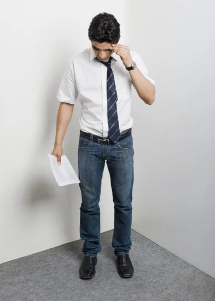 College student standing in the corner — Stock Photo, Image