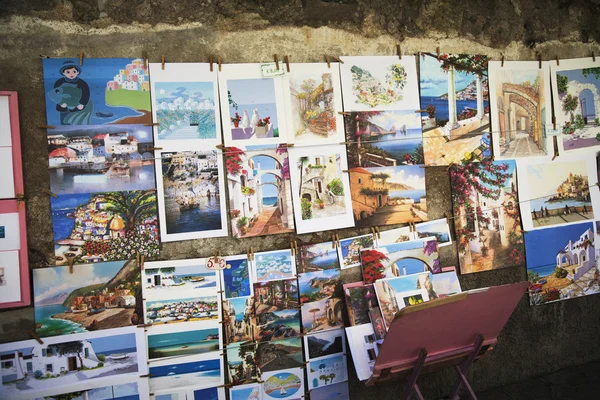 Paintings for sale at a market stall — Stock Photo, Image