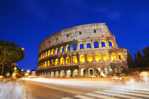Night traffic in front of Colosseum