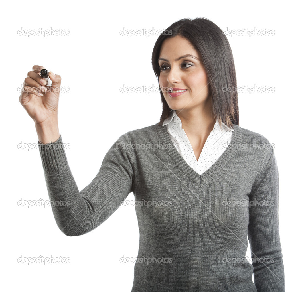 Businesswoman writing with a felt tip pen