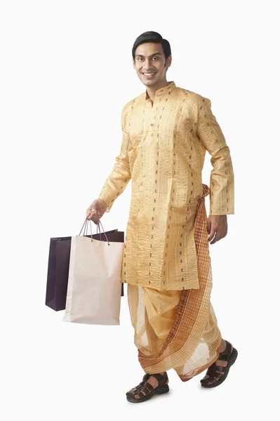 Bengálský muž, nošení nákupní tašky — Stock fotografie