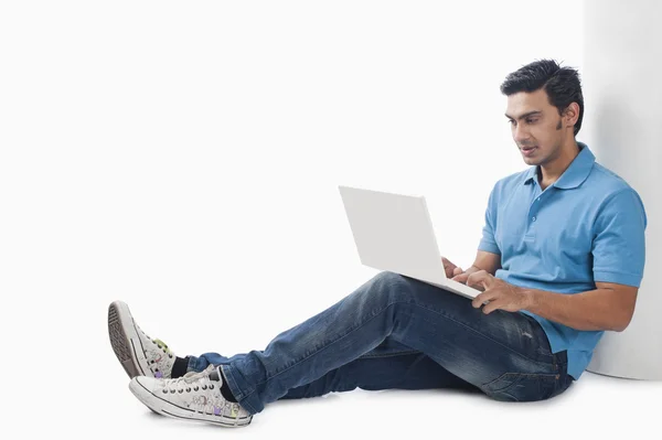 Bengali man using a laptop — Stock Photo, Image