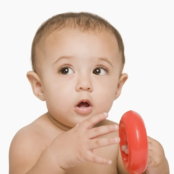 Baby boy playing with a toy — Stock Photo, Image