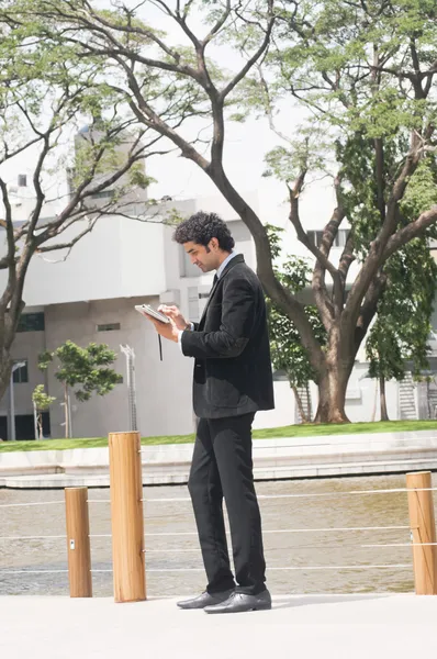 Businessman using a digital Tablet — Stock Photo, Image