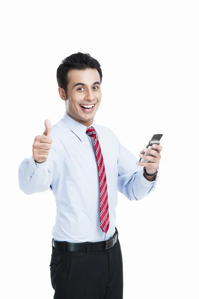 Businessman showing thumbs up sign — Stock Photo, Image