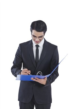 Businessman examining documents