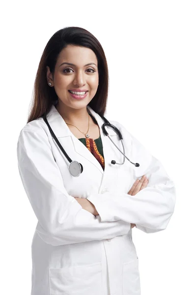 Doctor standing with her arms crossed — Stock Photo, Image