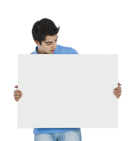 Man looking at a whiteboard — Stock Photo, Image