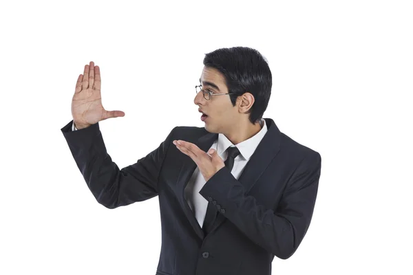 Surprised businessman gesturing — Stock Photo, Image