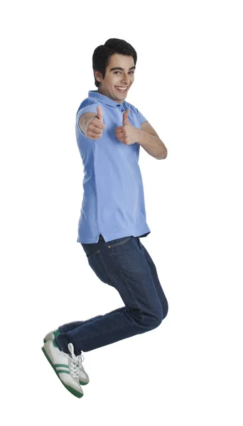 Man showing thumbs up sign — Stock Photo, Image