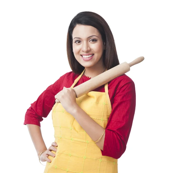 Woman holding a rolling pin — Stock Photo, Image