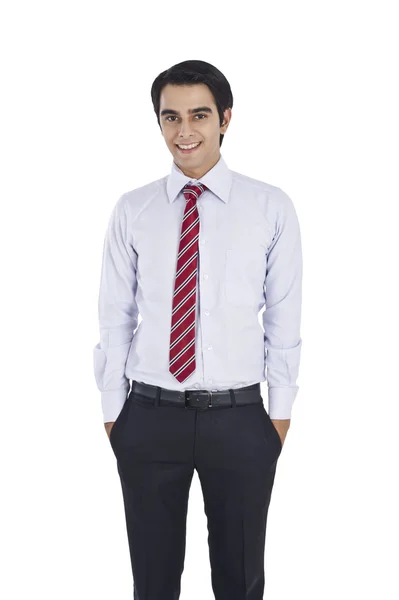 Businessman with his hands in pockets — Stock Photo, Image