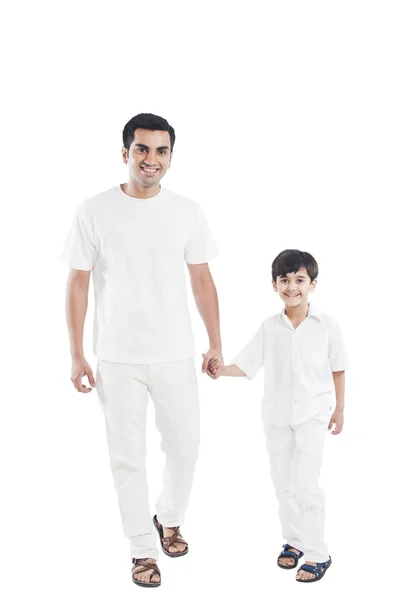 Father and son holding hands — Stock Photo, Image