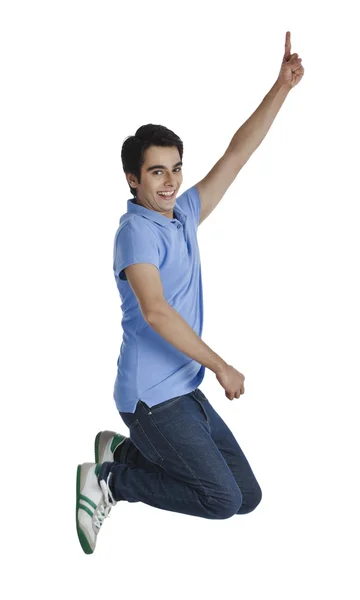 Man jumping and pointing — Stock Photo, Image