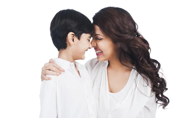 Happy mother and son nuzzling — Stock Photo, Image