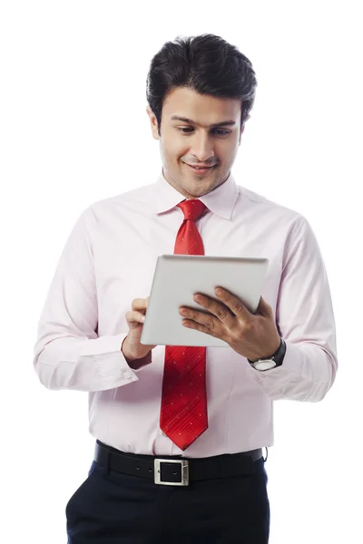 Businessman using a digital tablet — Stock Photo, Image