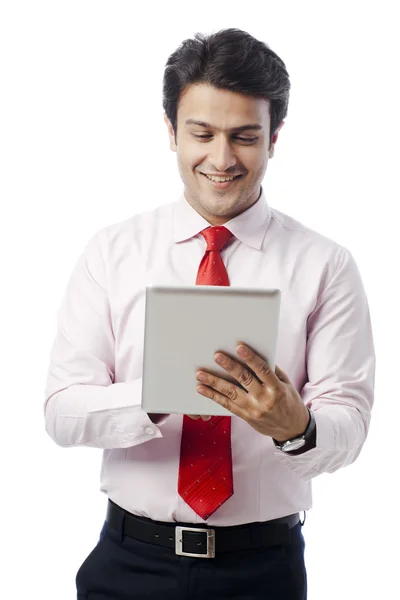 Businessman using a digital tablet — Stock Photo, Image