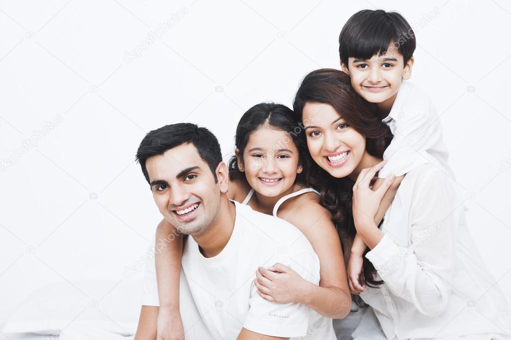 Happy family on the bed