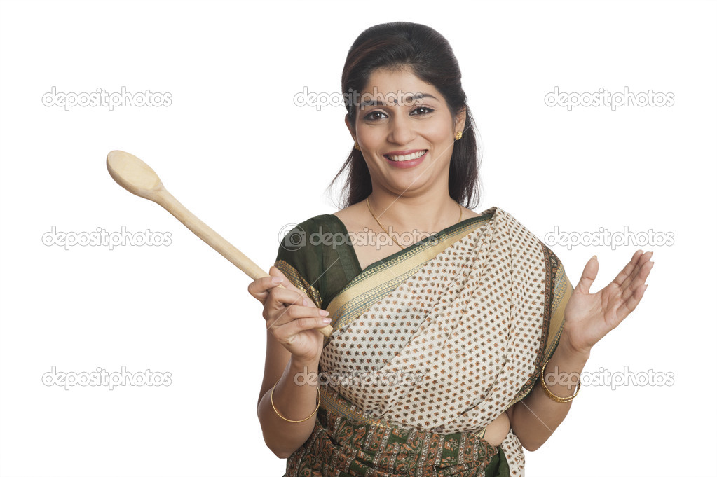 Woman holding Wooden ladle