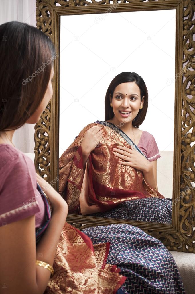 Reflection of a woman in mirror