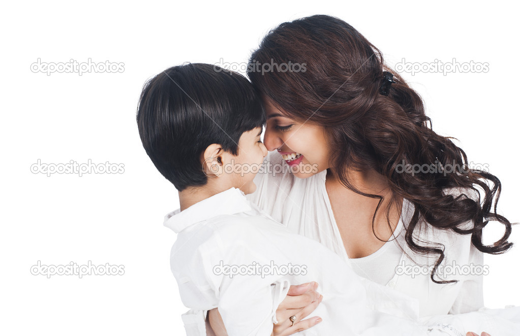 Happy mother and son nuzzling