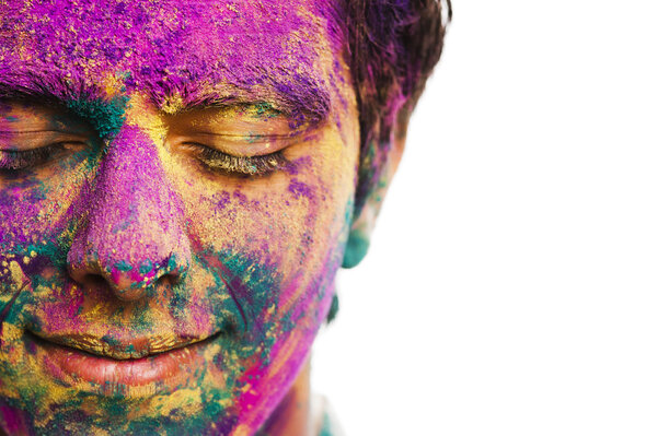 Mans face covered with powder paint