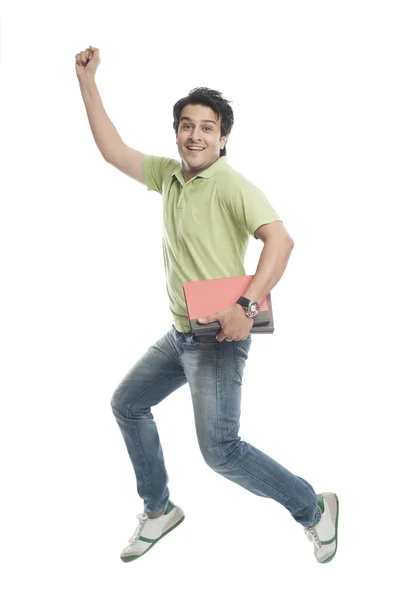 University student running with holding books — Stock Photo, Image